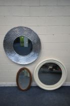 A LARGE CIRCULAR SILVER PAINTED RIDGED WALL MIRROR, diameter 108cm, a large cream painted wooden