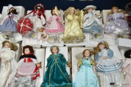 TWELVE BOXED DANBURY MINT 'THE STORYBOOK DOLL COLLECTION' COLLECTORS DOLLS, all with stands and