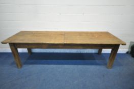 A LARGE RECTANGULAR PINE PLANK TOP TABLE, on block legs, length 273cm x depth 90cm x height 79cm (