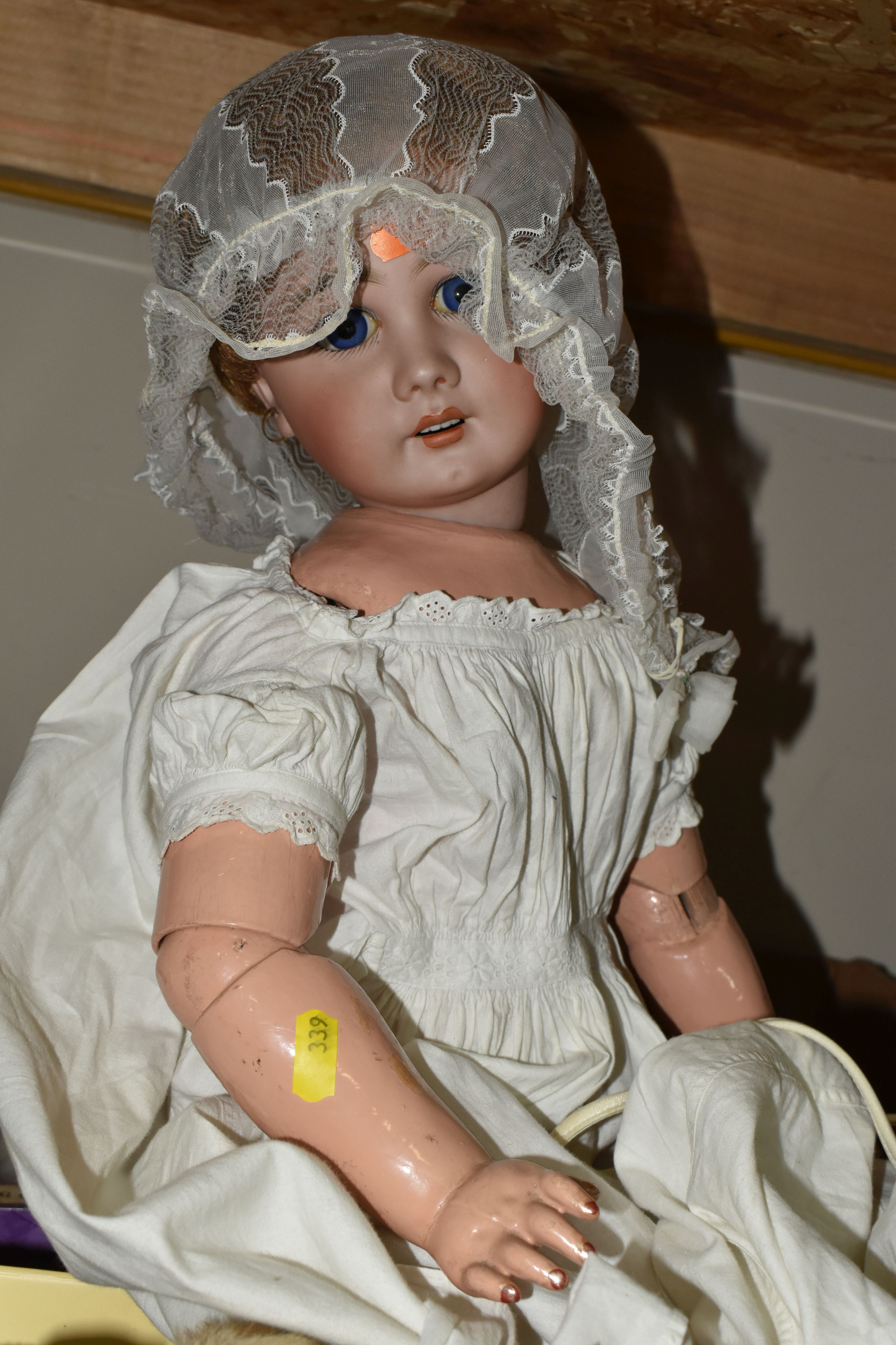 THREE BOXES OF VINTAGE TOYS, DOLLS AND GAMES, to include a porcelain doll with composite body, - Image 5 of 9