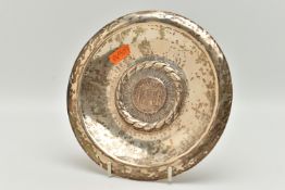 A PERUVIAN WHITE METAL DISH MOUNTED WITH A SPANISH COIN, round dish, stamped to the reverse '