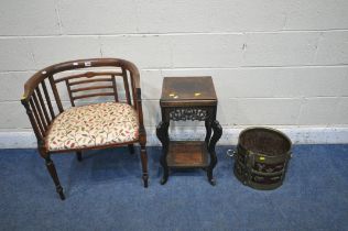 AN EDWARDIAN MAHOGANY AND INLAID ARMCHAIR, with beige and foliate upholstery, a hardwood lamp table,