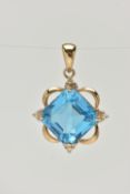 A 9CT GOLD BLUE TOPAZ AND DIAMOND PENDANT, set with a square cut blue topaz with single cut