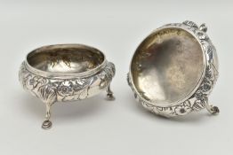 A PAIR OF EARLY VICTORIAN SILVER SALTS, of circular outline with embossed floral and foliate