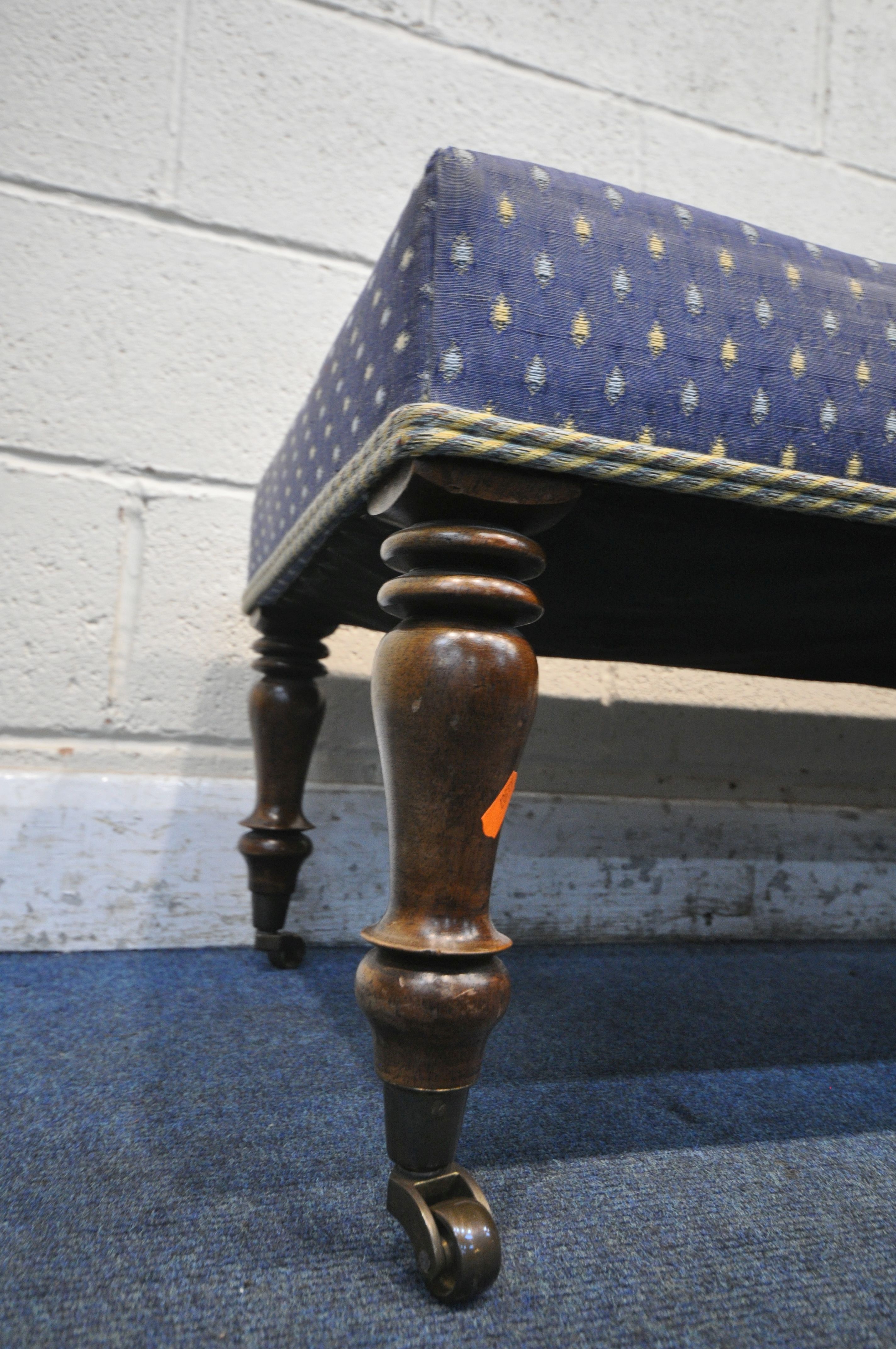 TWO EARLY 20TH CENTURY STOOLS, the larger stool with blue upholstery, raised on turned legs and - Image 3 of 4