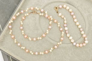 A CUTLURED PEARL NECKLACE AND BRACELET, baroque pearl necklace with yellow metal spacers, fitted