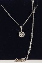 A 9CT WHITE GOLD DIAMOND PENDANT AND WHITE METAL CHAIN, a circular cluster pendant, set with a