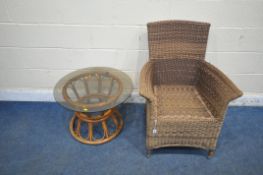 A COZY BAY RATTAN ARMCHAIR, along with a circular smoked glass table (condition report: general