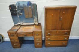 A 20TH CENTURY OAK TWO PIECE SUITE, comprising a cabinet with double doors, above three drawers,