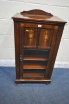 A VICTORIAN ROSEWOOD MUSIC CABINET, with a raised back, the single drawer with marquetry inlaid