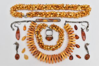 AN ASSORTMENT OF AMBER JEWELLERY, to include a large statement necklace, comprised of thirty nine
