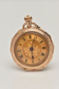 A 12CT GOLD OPEN FACE POCKET WATCH, hand wound movement, floral dial, Roman numerals, yellow gold