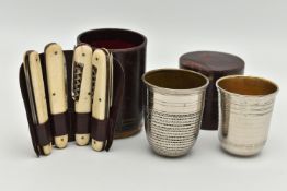 A SELECTION OF ITEMS, to include two non-matching campaign drinking cups in a leather tubular