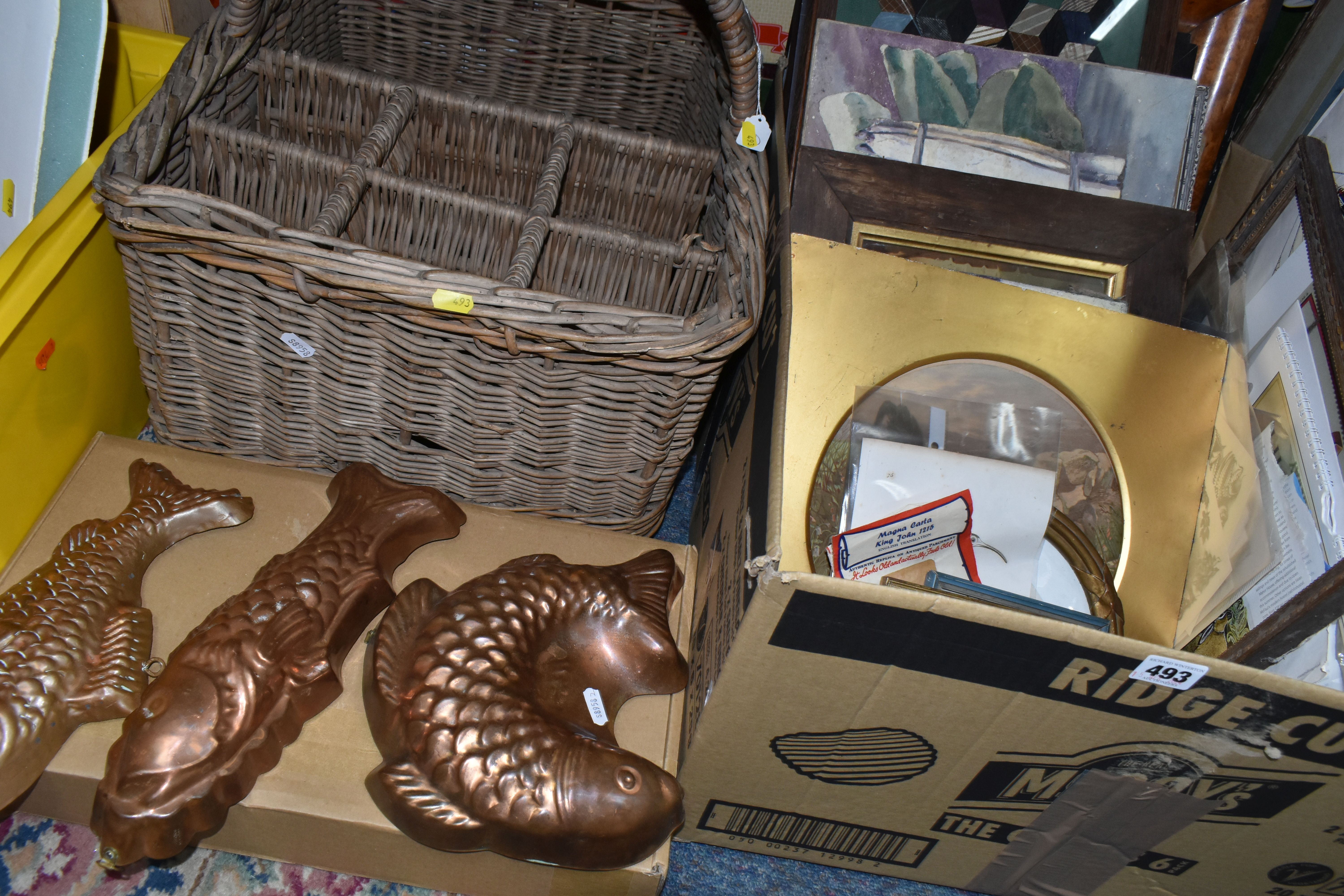 A BOX AND LOOSE OF PICTURES, THREE REPRODUCTION COPPER FISH MOULDS AND A VINTAGE LARGE WICKER
