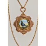 A 9CT GOLD MEDAL, a pigeon racing medal, designed with a ceramic painted pigeon to the centre,