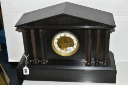 A BLACK SLATE CASED MANTEL CLOCK, of architectural form, the dial bearing Arabic numerals, with