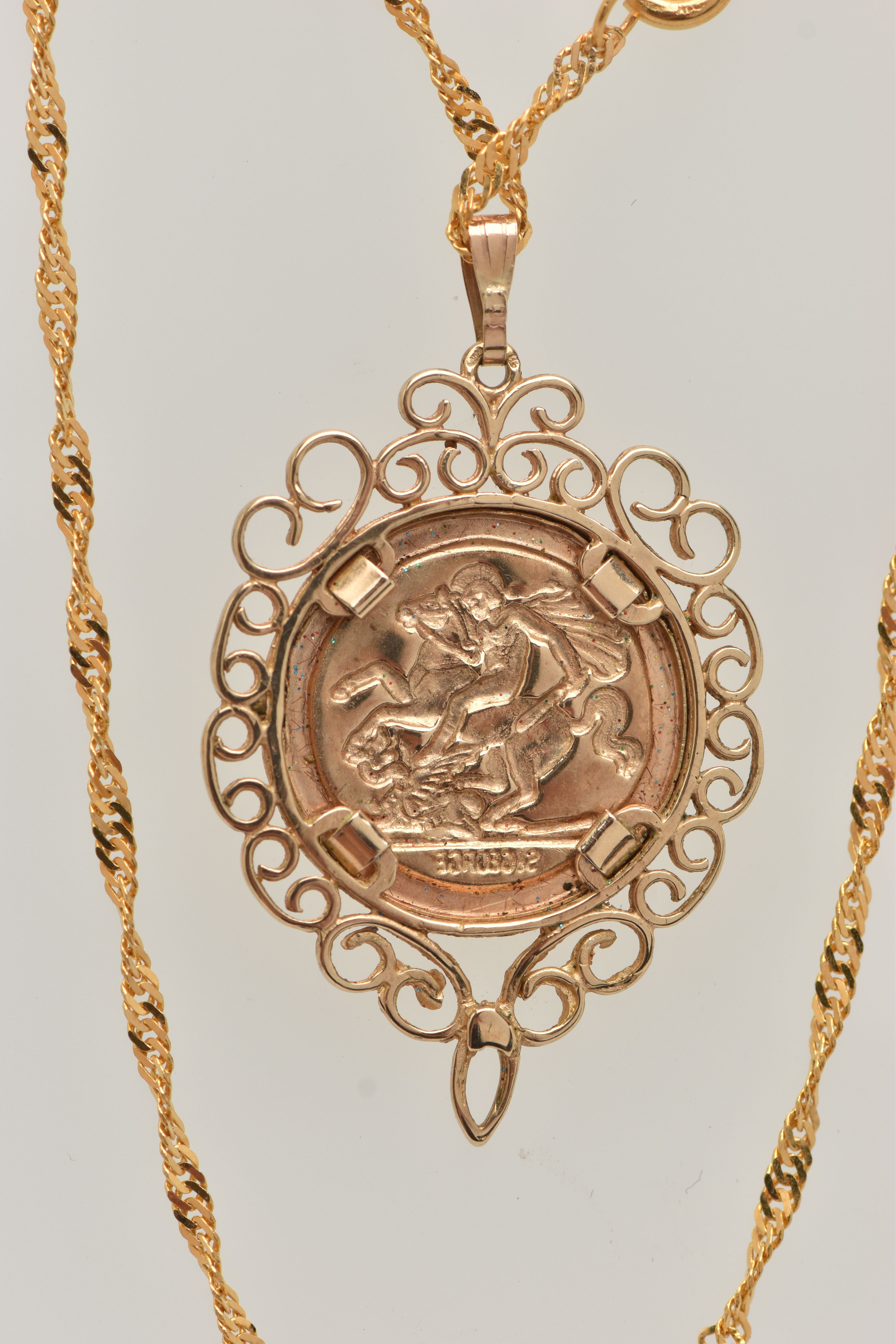 A 9CT GOLD COIN PENDANT, a George and the Dragon disk, with a scrolling open work mount, - Image 3 of 3