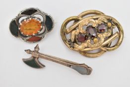 THREE BROOCHES, to include a white metal Scottish hardstone set brooch, with an oval cut orange