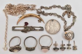 A SMALL BAG OF ASSORTED JEWELLERY, to include two white metal rings, both stamped 'Silver', an