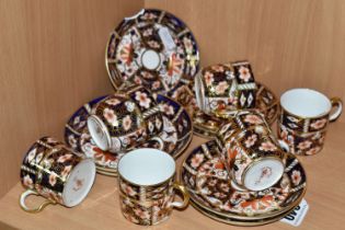 SIX ROYAL CROWN DERBY IMARI 2451 PATTERN COFFEE CUPS AND SAUCERS, comprising three coffee cups and