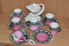 A SET OF SIX EDWARDIAN ROYAL WORCESTER 907 COFFEE CANS AND SAUCERS, featuring a black and white '