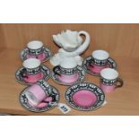 A SET OF SIX EDWARDIAN ROYAL WORCESTER 907 COFFEE CANS AND SAUCERS, featuring a black and white '