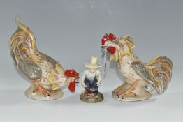 TWO 20TH CENTURY CONTINENTAL PORCELAIN FIGURES OF COCKERELS, posed as ready to fight each other,