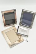 A WHITE METAL CIGARETTE CASE AND PHOTO FRAMES, the cigarette case engraved depicting the Taj Mahal