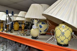 A GROUP OF TABLE LAMPS, comprising fourteen lamps, in different styles with shades, including
