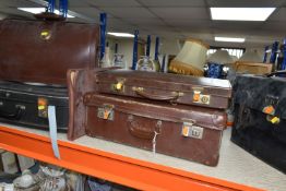 A GROUP OF SUITCASES AND BRIEFCASES, to include a small brown vintage suitcase, width 50cm x