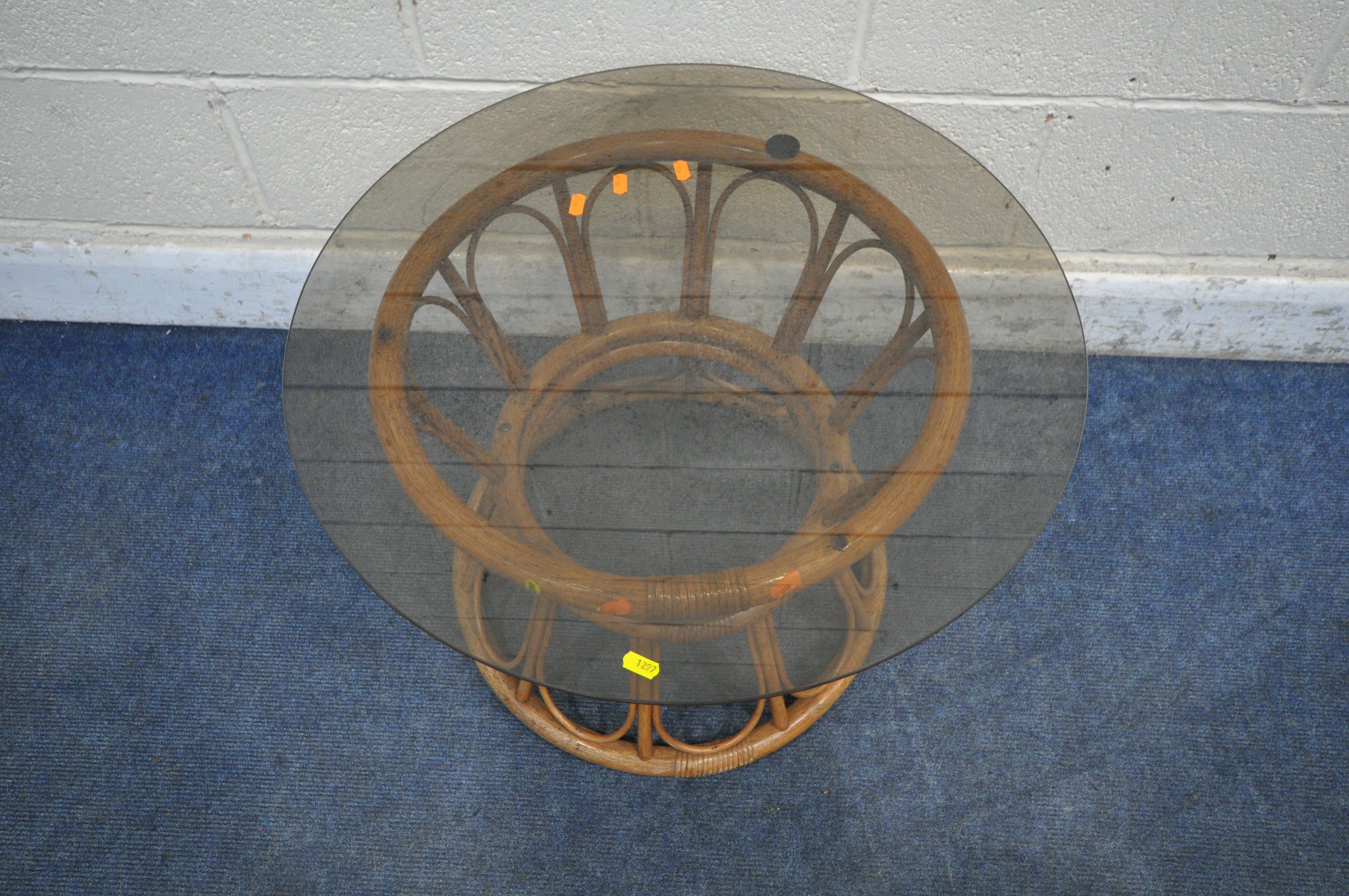 A COZY BAY RATTAN ARMCHAIR, along with a circular smoked glass table (condition report: general - Image 4 of 4