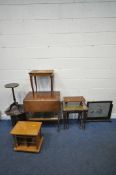 A 20TH CENTURY OAK TWO TIER DROP LEAF TEA TROLLEY, a lidded musical sewing box and contents, a