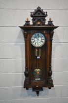 A LATE 19TH CENTURY REGULATOR WALL CLOCK, the arched glass door enclosing a brass and enamel 8