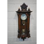 A LATE 19TH CENTURY REGULATOR WALL CLOCK, the arched glass door enclosing a brass and enamel 8