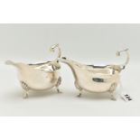 A PAIR OF GEORGE V SAUCE BOATS, typical form silver sauce boats, scalloped rim, scrolled handle with