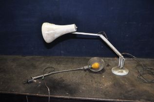 AN EARLY 20th CENTURY INDUSTRIAL MACHINE LAMP with gooseneck stem and a later Anglepoise style