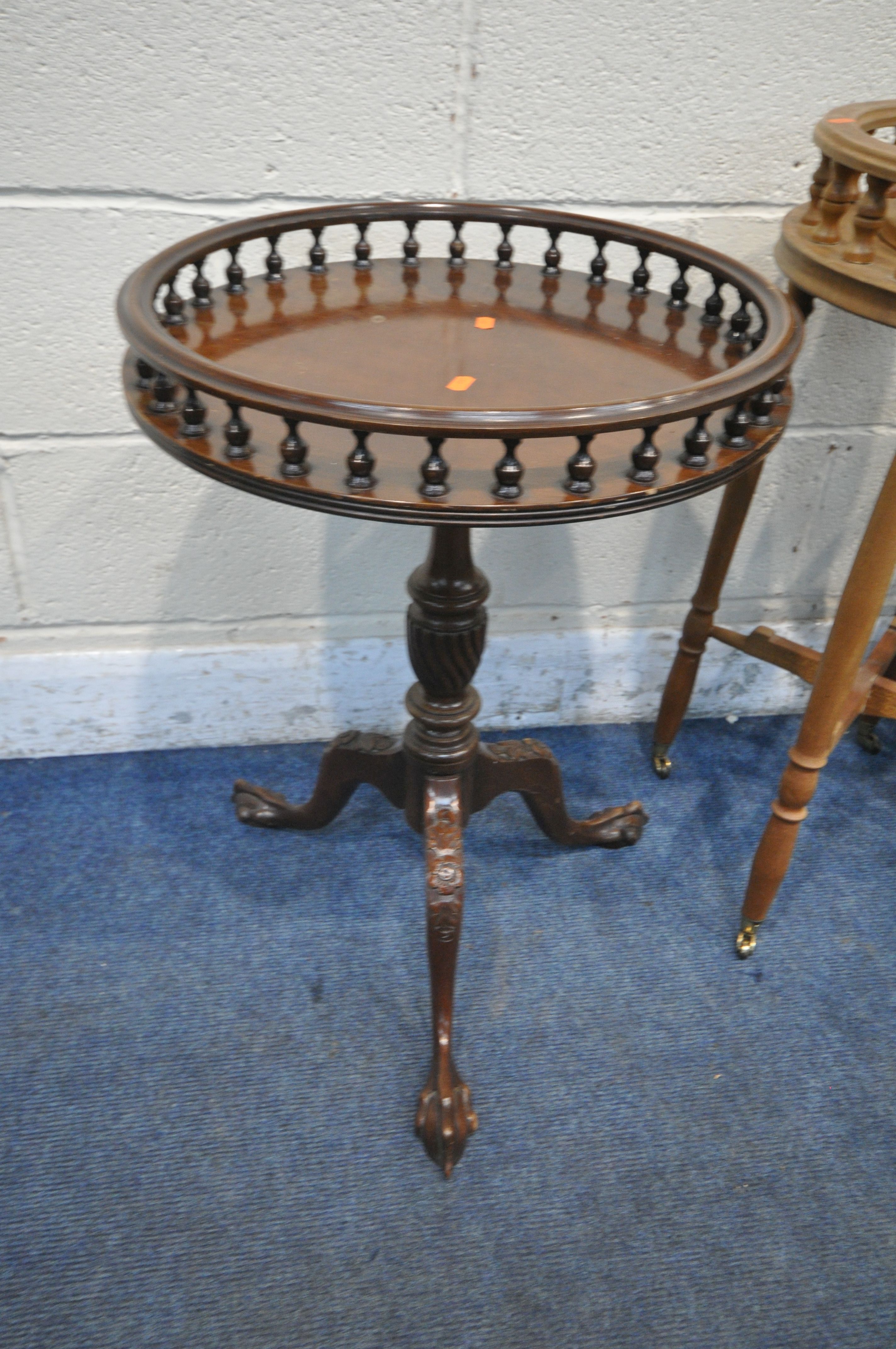 A REPRODUCTION MAHOGANY CIRCULAR TRIPOD TABLE, with raised gallery, turned support and ball and claw - Image 2 of 3