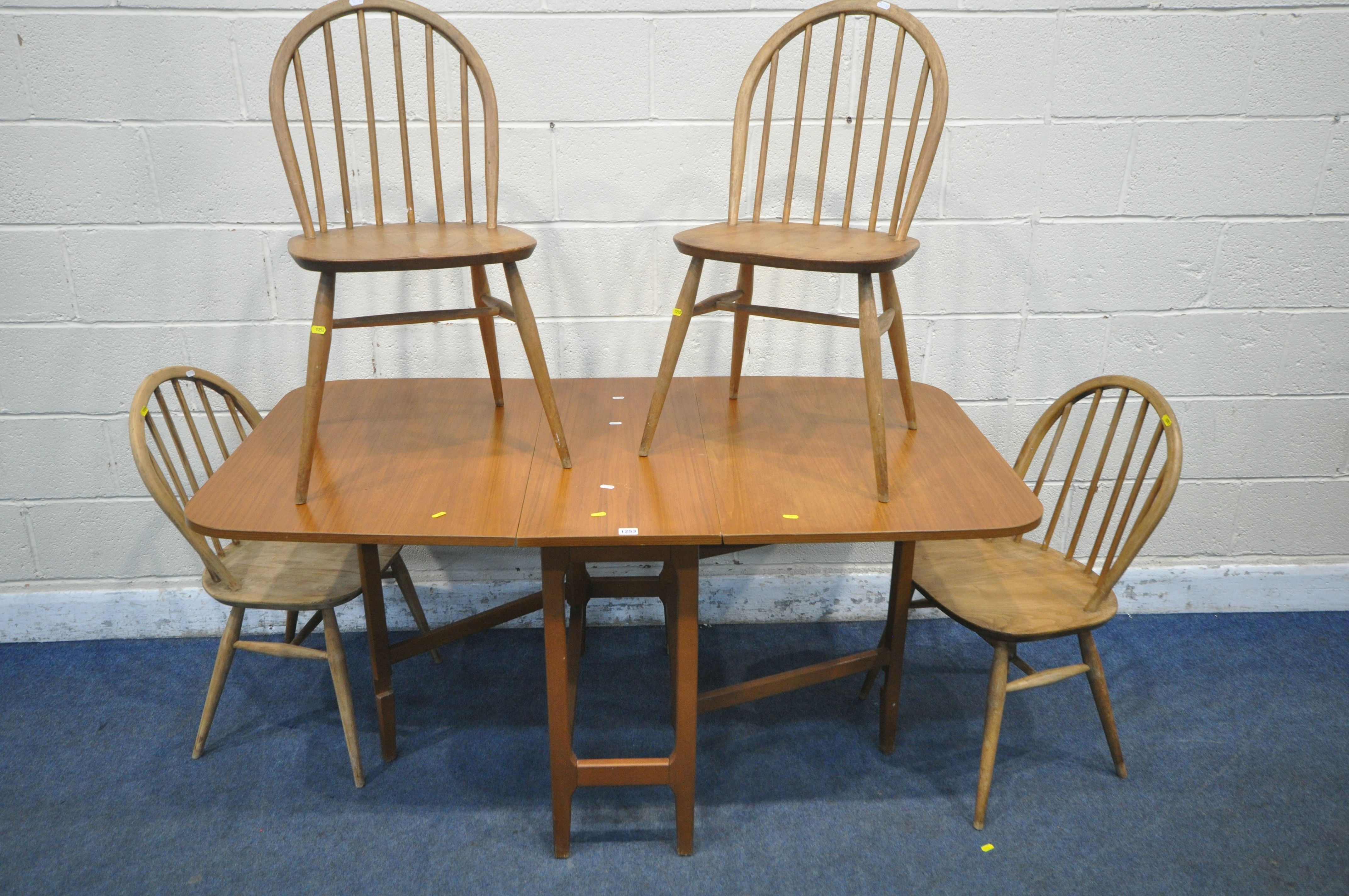 A MID CENTURY TEAK DROP LEAF TABLE, open width 150cm x closed width 34cm x depth 83cm x height 73cm,