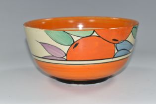 A NEWPORT POTTERY BOWL HANDPAINTED WITH A DESIGN OF ORANGES, orange band to inner rim, black printed