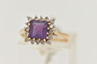 A 9CT GOLD AMETHYST AND DIAMOND CLUSTER RING, set with a central square cut amethyst, in a