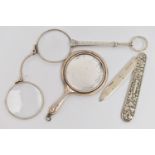A PAIR OF LORGNETTES, SMALL MIRROR AND A FRUIT KNIFE, white metal lorgnettes, unmarked, a small hand