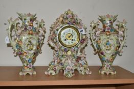 A GERMAN PORCELAIN CLOCK GARNITURE SET, porcelain clock garniture, late 19th century, the