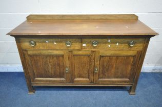 A 20TH CENTURY OAK SIDEBOARD, with a raised back, two drawers, above two cupboard doors, length