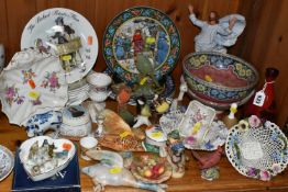 A SELECTION OF DECORATIVE CERAMIC ITEMS, to include a Royal Worcester dish raised upon a circular
