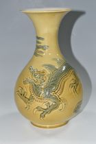 A LLADRO RELIEF MOULDED DRAGON VASE, the mustard ground decorated with a four clawed dragon, printed