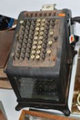 AN EARLY 20TH CENTURY BURROUGHS MECHANICAL CALCULATOR ADDING MACHINE, bevelled glass panel to front,