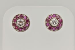 A PAIR OF DIAMOND AND RUBY EARRINGS, designed as a round brilliant cut diamond, set with a