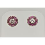 A PAIR OF DIAMOND AND RUBY EARRINGS, designed as a round brilliant cut diamond, set with a