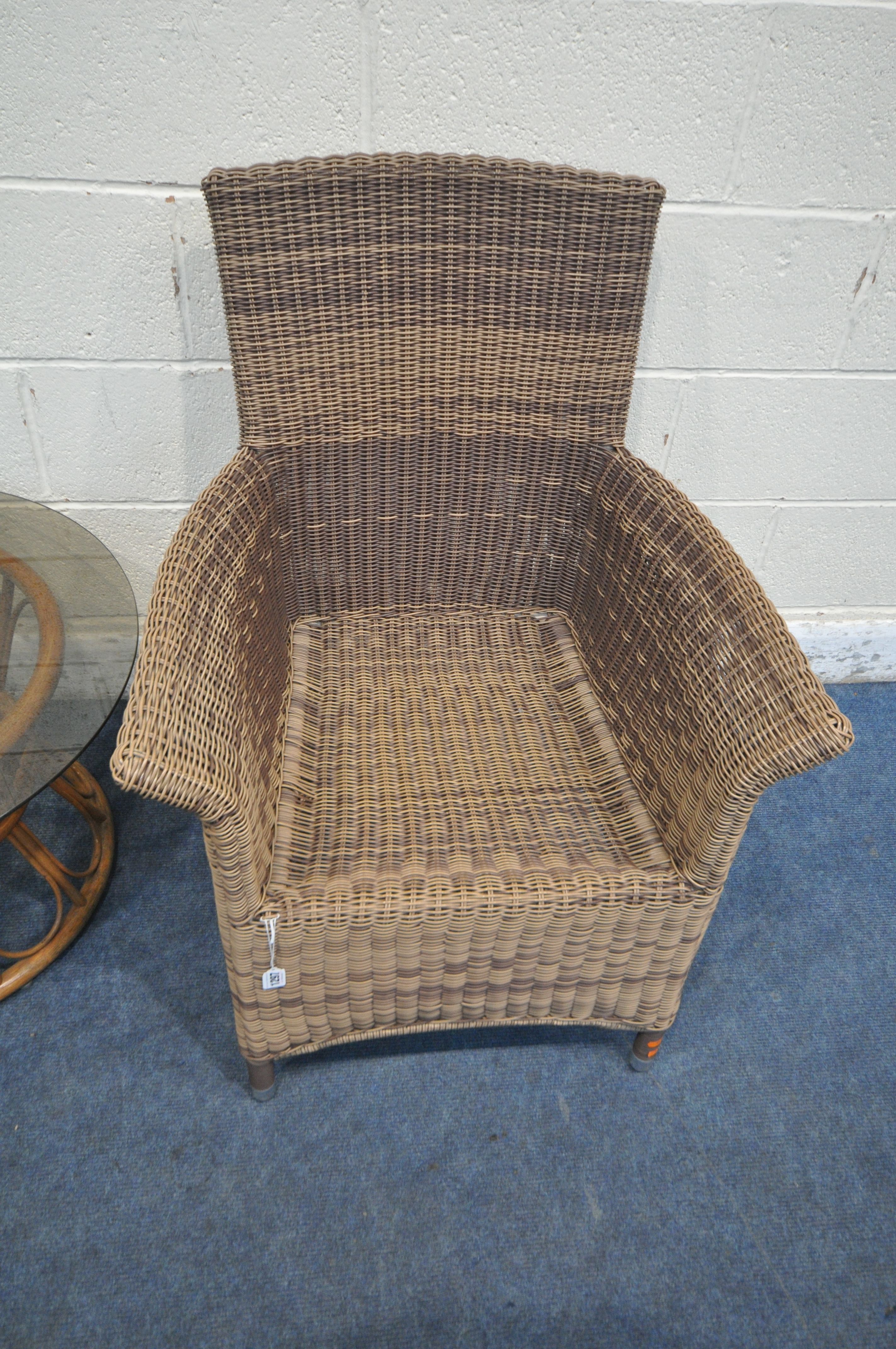 A COZY BAY RATTAN ARMCHAIR, along with a circular smoked glass table (condition report: general - Image 2 of 4