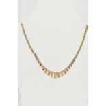 A 9CT GOLD NECKLACE, a yellow gold brick link necklace with fringe detail, fitted with a push pin